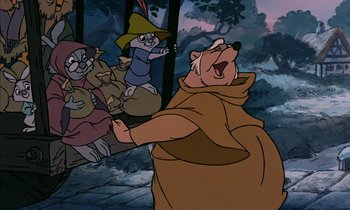 Movie still from “Robin Hood” (1973), directed by David Hand – A group of people riding on the back of a bear; Medium shot, Low angle