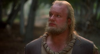 Movie still from “Robin Hood: Men in Tights” (1993), directed by Mel Brooks – A man with a long beard and a long mustache; Close Up shot, Low angle