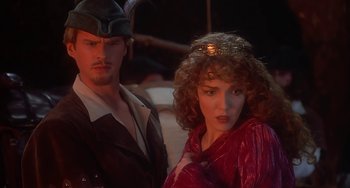 Movie still from “Robin Hood: Men in Tights” (1993), directed by Mel Brooks – A man and a woman dressed up in costumes; Close Up shot, Over the shoulder angle