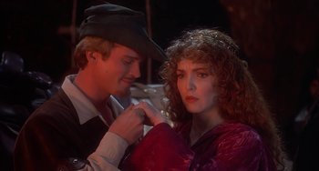 Movie still from “Robin Hood: Men in Tights” (1993), directed by Mel Brooks – A man and a woman are looking at each other; Close Up shot, Over the shoulder angle