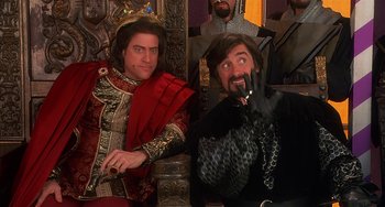 Movie still from “Robin Hood: Men in Tights” (1993), directed by Mel Brooks – Two men dressed up as a king and a queen; Medium shot, Over the shoulder angle
