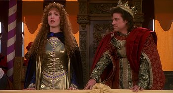 Movie still from “Robin Hood: Men in Tights” (1993), directed by Mel Brooks – A man and a woman dressed in medieval costumes; Medium shot, Over the shoulder angle
