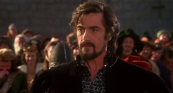 Movie still from “Robin Hood: Men in Tights” (1993), directed by Mel Brooks – A person with a beard; Close Up shot, Over the shoulder angle
