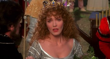 Movie still from “Robin Hood: Men in Tights” (1993), directed by Mel Brooks – A person wearing a crown; Close Up shot, High angle