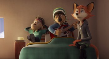 Movie still from “Rock Dog 2: Rock Around the Park” (2021), directed by Mark Baldo – A group of people sitting on a bed with a guitar; Wide shot, High angle
