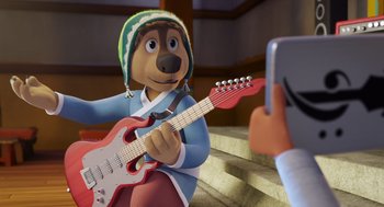 Movie still from “Rock Dog 2: Rock Around the Park” (2021), directed by Mark Baldo – A person taking a picture of a cartoon character with a guitar; Medium shot, Over the shoulder angle