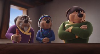 Movie still from “Rock Dog 2: Rock Around the Park” (2021), directed by Mark Baldo – A group of cartoon dogs standing next to each other; Medium shot, Over the shoulder angle