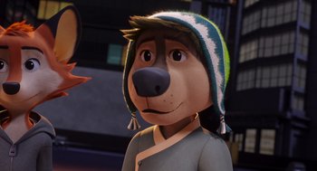 Movie still from “Rock Dog 2: Rock Around the Park” (2021), directed by Mark Baldo – A cartoon dog wearing a green and white hat; Close Up shot, Over the shoulder angle