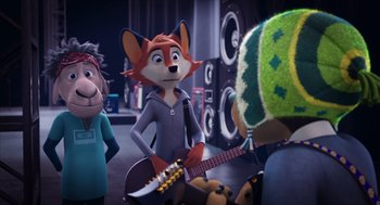 Movie still from “Rock Dog 2: Rock Around the Park” (2021), directed by Mark Baldo – A group of people that are standing around a guitar; Medium shot, Over the shoulder angle
