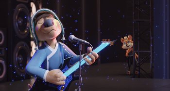 Movie still from “Rock Dog 2: Rock Around the Park” (2021), directed by Mark Baldo – A cartoon dog playing guitar in front of a microphone; Medium shot, Over the shoulder angle