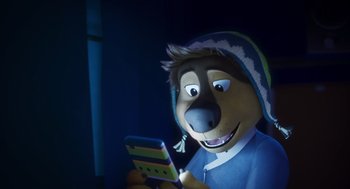 Movie still from “Rock Dog 2: Rock Around the Park” (2021), directed by Mark Baldo – A man in a blue shirt is looking at a phone; Medium shot, High angle
