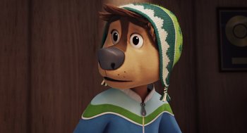 Movie still from “Rock Dog 2: Rock Around the Park” (2021), directed by Mark Baldo – A cartoon of a dog wearing a sweater and a hat; Close Up shot, Over the shoulder angle
