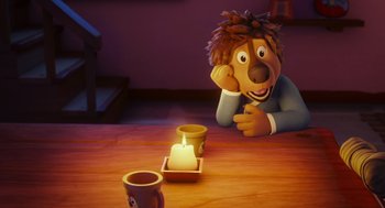Movie still from “Rock Dog 2: Rock Around the Park” (2021), directed by Mark Baldo – A cartoon character sitting at a table with a lit candle; Medium shot, High angle