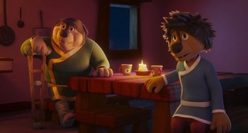 Movie still from “Rock Dog 2: Rock Around the Park” (2021), directed by Mark Baldo – A couple of people sitting at a wooden table; Medium shot, Over the shoulder angle