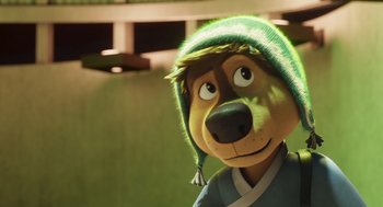 Movie still from “Rock Dog 2: Rock Around the Park” (2021), directed by Mark Baldo – A stuffed animal wearing a hat; Close Up shot, Over the shoulder angle