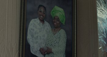 Movie still from “Rocks” (2019), directed by Sarah Gavron – A picture of two women standing next to each other; Extreme Close Up shot, High angle