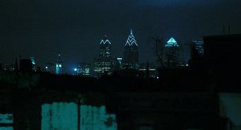 Movie still from “Rocky Balboa” (2006), directed by Sylvester Stallone – A view of a city skyline at night with the lights on; Extreme Wide shot, High angle