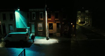 Movie still from “Rocky Balboa” (2006), directed by Sylvester Stallone – A person walking down a street at night; Extreme Wide shot, High angle