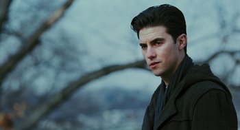 Movie still from “Rocky Balboa” (2006), directed by Sylvester Stallone – A man with a black jacket and a tree in the background; Close Up shot, Over the shoulder angle