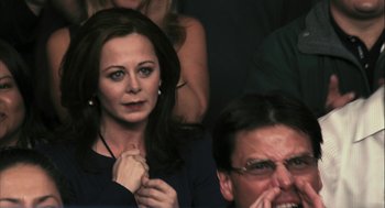 Movie still from “Rocky Balboa” (2006), directed by Sylvester Stallone – A woman and a man sitting next to each other; Close Up shot, Over the shoulder angle