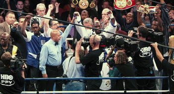 Movie still from “Rocky Balboa” (2006), directed by Sylvester Stallone – A group of people standing in a boxing ring; Extreme Wide shot, High angle