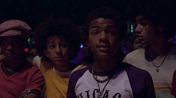Movie still from “Roll Bounce” (2005), directed by Malcolm D. Lee – A group of young men standing next to each other; Close Up shot, Low angle