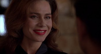 Movie still from “Romeo Is Bleeding” (1993), directed by Peter Medak – A person with red lipstick; Close Up shot, Over the shoulder angle