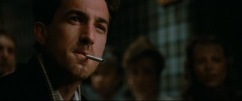 Movie still from “'Round Midnight” (1986), directed by Bertrand Tavernier – A person with a cigarette in his mouth; Close Up shot, Low angle