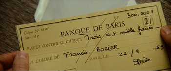 Movie still from “'Round Midnight” (1986), directed by Bertrand Tavernier – A bank note with the name of a bank in french written on it; Extreme Close Up shot, Overhead angle