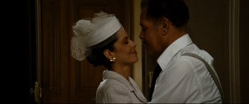 Movie still from “'Round Midnight” (1986), directed by Bertrand Tavernier – A man and a woman are standing next to each other; Close Up shot, Low angle