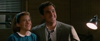 Movie still from “'Round Midnight” (1986), directed by Bertrand Tavernier – A man in a suit and tie next to a woman in a polka dot dress; Close Up shot, Low angle