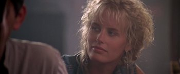 Movie still from “Roxanne” (1987), directed by Fred Schepisi – A person wearing a jean jacket; Close Up shot, Over the shoulder angle