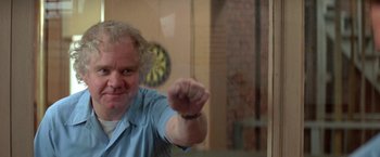 Movie still from “Roxanne” (1987), directed by Fred Schepisi – A man is pointing his finger at the camera; Close Up shot, Over the shoulder angle