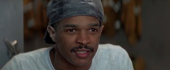 Movie still from “Roxanne” (1987), directed by Fred Schepisi – A person wearing a hat; Close Up shot, Low angle