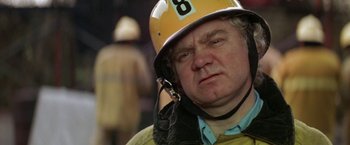 Movie still from “Roxanne” (1987), directed by Fred Schepisi – A person wearing a helmet; Close Up shot, Low angle