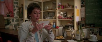 Movie still from “Roxanne” (1987), directed by Fred Schepisi – A woman holding a piece of paper in her hands; Close Up shot, Over the shoulder angle