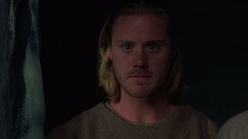 Movie still from “Royal Deceit” (1994), directed by Gabriel Axel – A person with long blonde hair; Close Up shot, Low angle