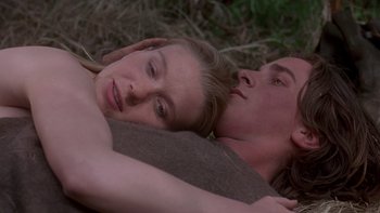 Movie still from “Royal Deceit” (1994), directed by Gabriel Axel – A man and a woman laying on the ground; Close Up shot, High angle