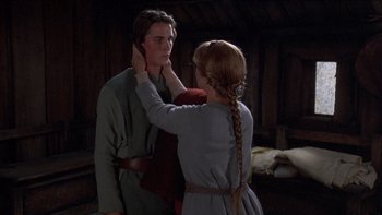 Movie still from “Royal Deceit” (1994), directed by Gabriel Axel – A man and a woman are standing in a room; Medium shot, Over the shoulder angle