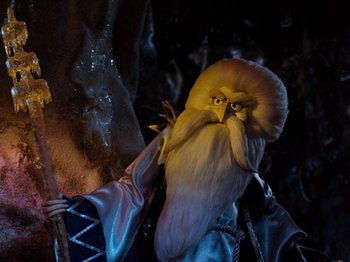 Movie still from “Rudolph and Frosty's Christmas in July” (1979), directed by Jules Bass – A person dressed as a wizard; Close Up shot, Low angle
