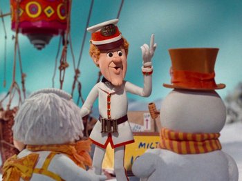 Movie still from “Rudolph and Frosty's Christmas in July” (1979), directed by Jules Bass – A cartoon of a man dressed in a white uniform; Medium shot, Low angle