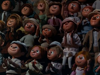 Movie still from “Rudolph and Frosty's Christmas in July” (1979), directed by Jules Bass – A bunch of people that are sitting in a room; Medium shot, Low angle