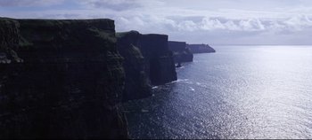 Movie still from “Ryan's Daughter” (1970), directed by David Lean – A view of the cliffs of moher from the ocean; Extreme Wide shot, High angle