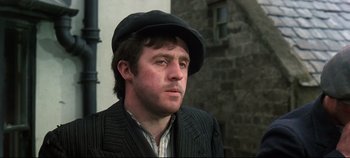 Movie still from “Ryan's Daughter” (1970), directed by David Lean – A person wearing a hat; Close Up shot, Low angle