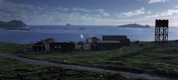 Movie still from “Ryan's Daughter” (1970), directed by David Lean – A view of the ocean from a grassy field; Extreme Wide shot, High angle