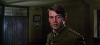Movie still from “Ryan's Daughter” (1970), directed by David Lean – A person wearing a uniform; Close Up shot, Low angle