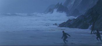 Movie still from “Ryan's Daughter” (1970), directed by David Lean – A person running on the beach in front of the ocean; Extreme Wide shot, Low angle