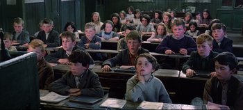 Movie still from “Ryan's Daughter” (1970), directed by David Lean – A group of children sitting in a class room; Medium shot, High angle
