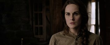 Movie still from “Godless” (2017), directed by Scott Frank – A person wearing a shirt; Close Up shot, Over the shoulder angle