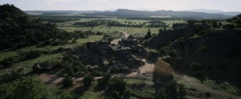 Movie still from “Godless” (2017), directed by Scott Frank – An aerial view of an abandoned village in the middle of the desert; Extreme Wide shot, High angle